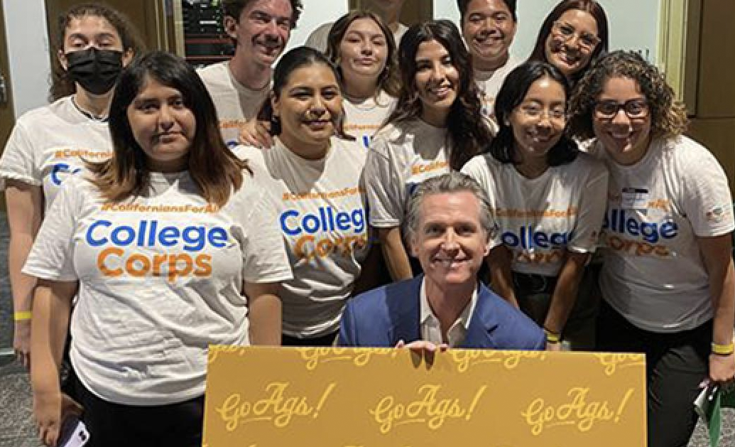 Students taking a photo with Governor Newsom