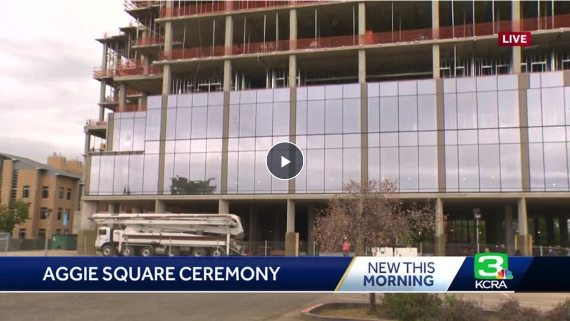 Screenshot of a KRCA video of showing an under-construction Aggie Square building