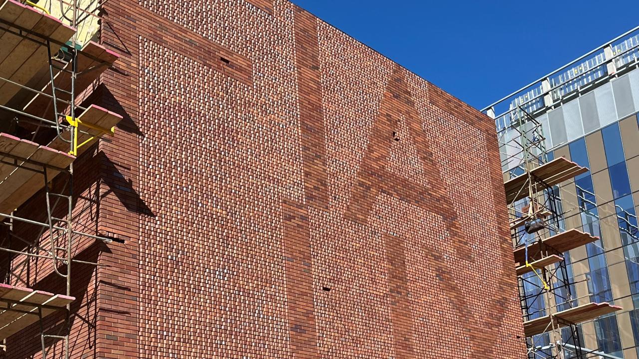 Fiat Lux brick facade