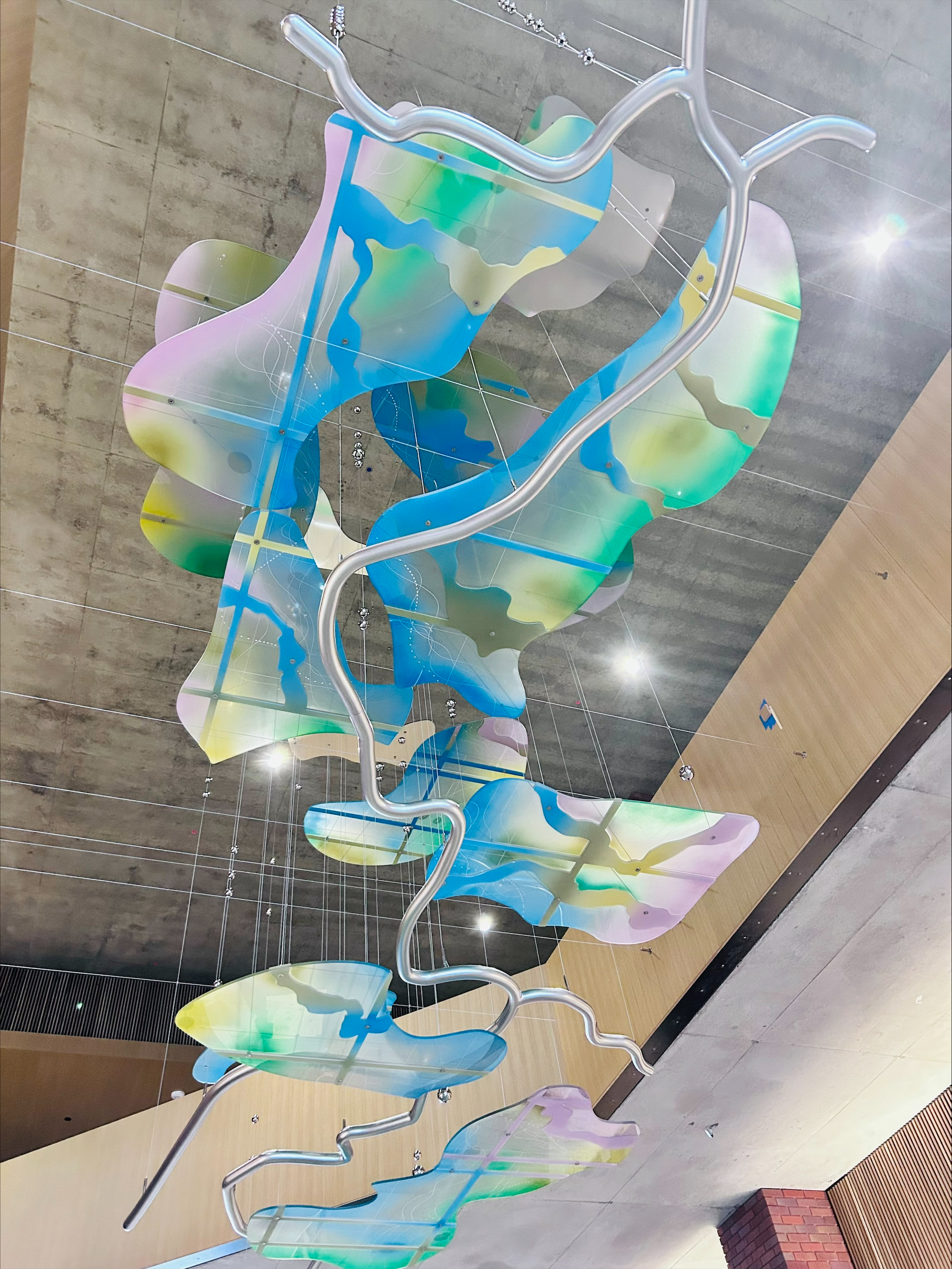 Abstract mural of a river and the land around it
