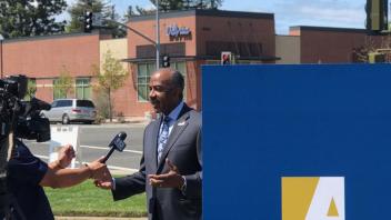 Chancellor May speaks to a televison news station.