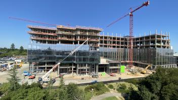 Color image of the partial construction of the Life-long Learning Center at Aggie Square.