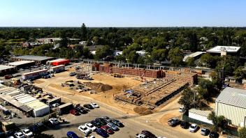 Aerial view of the Mixed-use Residential Building construction site in September