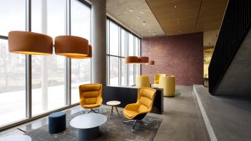 Tables and chairs next to windows