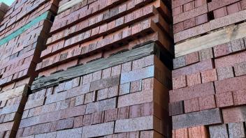 Pallets of red bricks