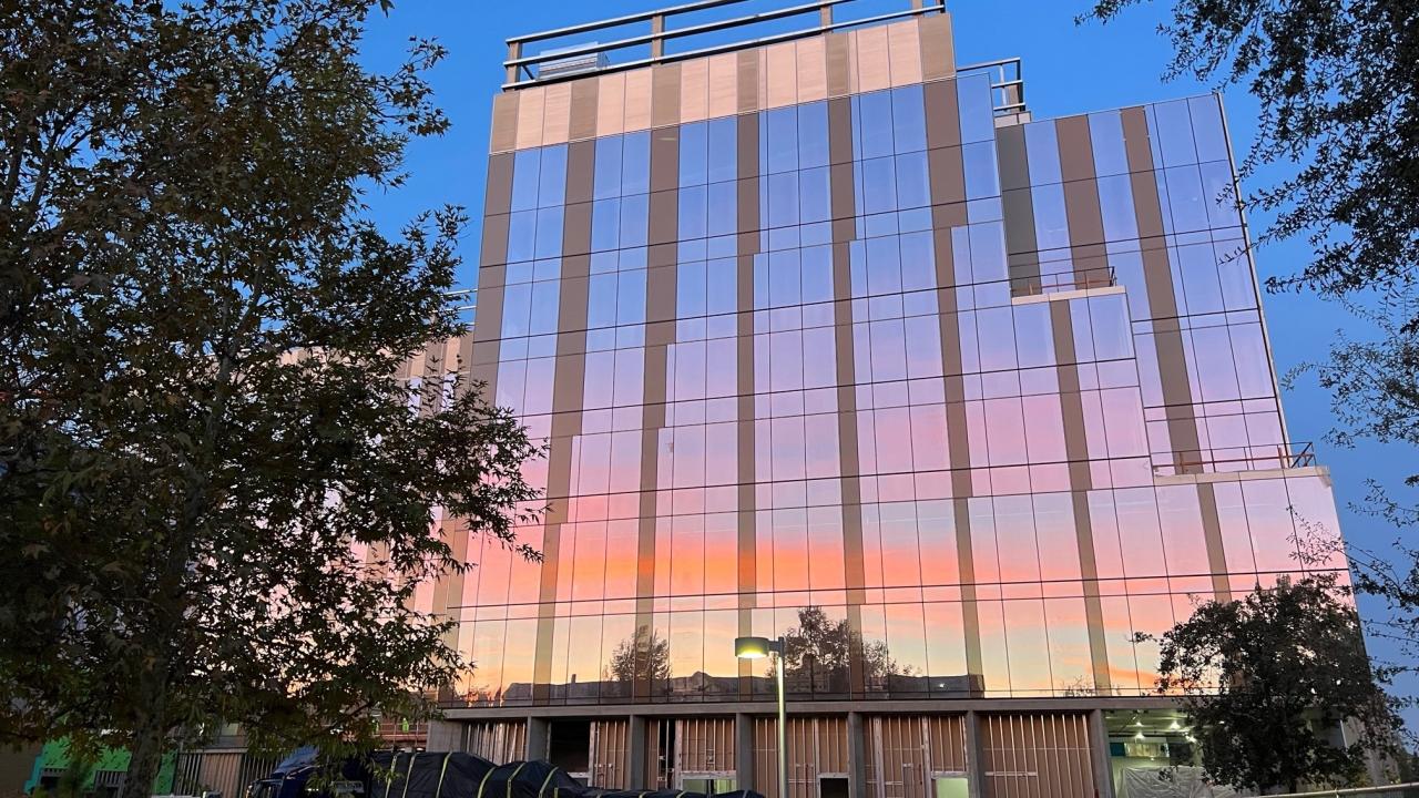 Sunrise reflected on windows of a building