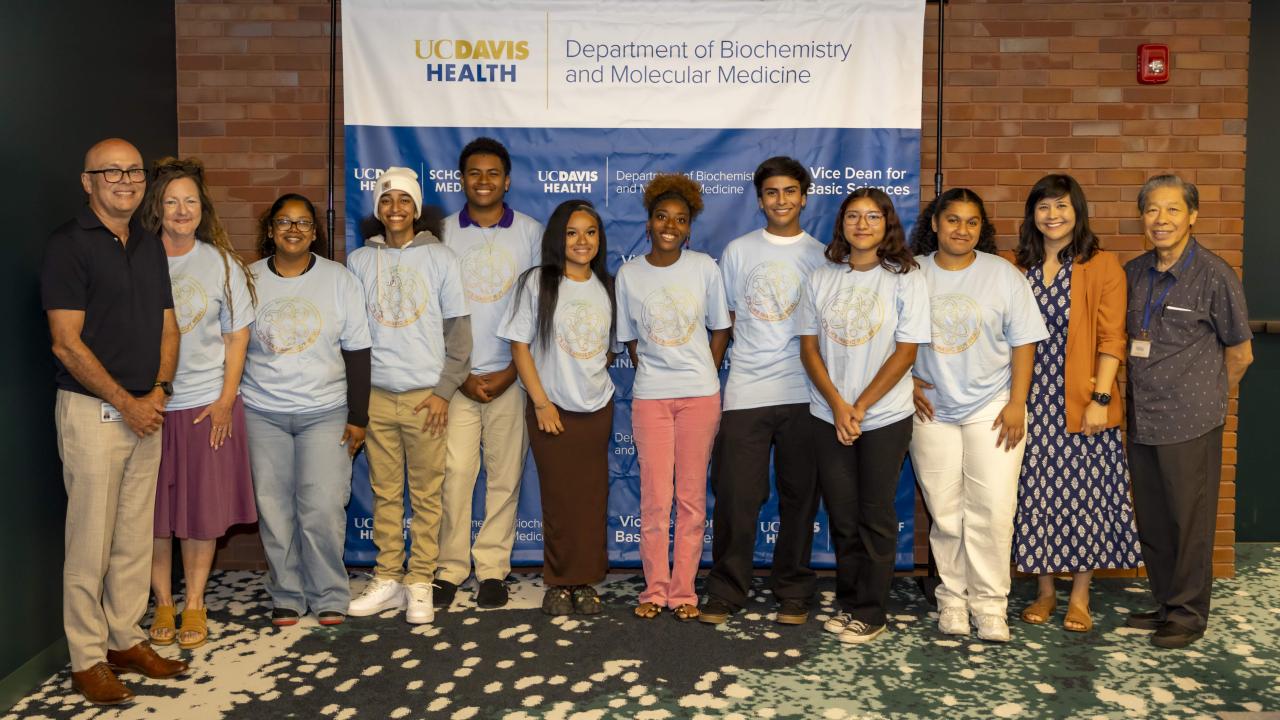 A group of high school students pose for a photo