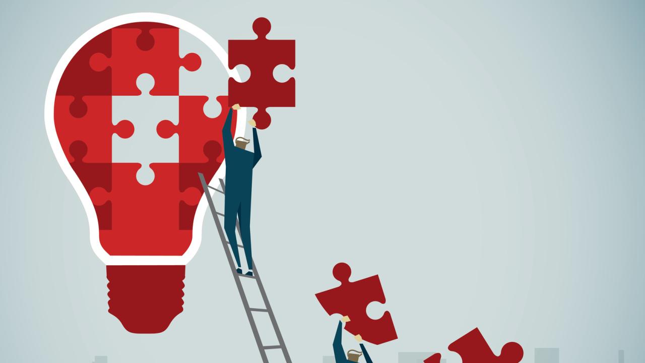 An illustration of people holding puzzle pieces and filling in a giant light bulb