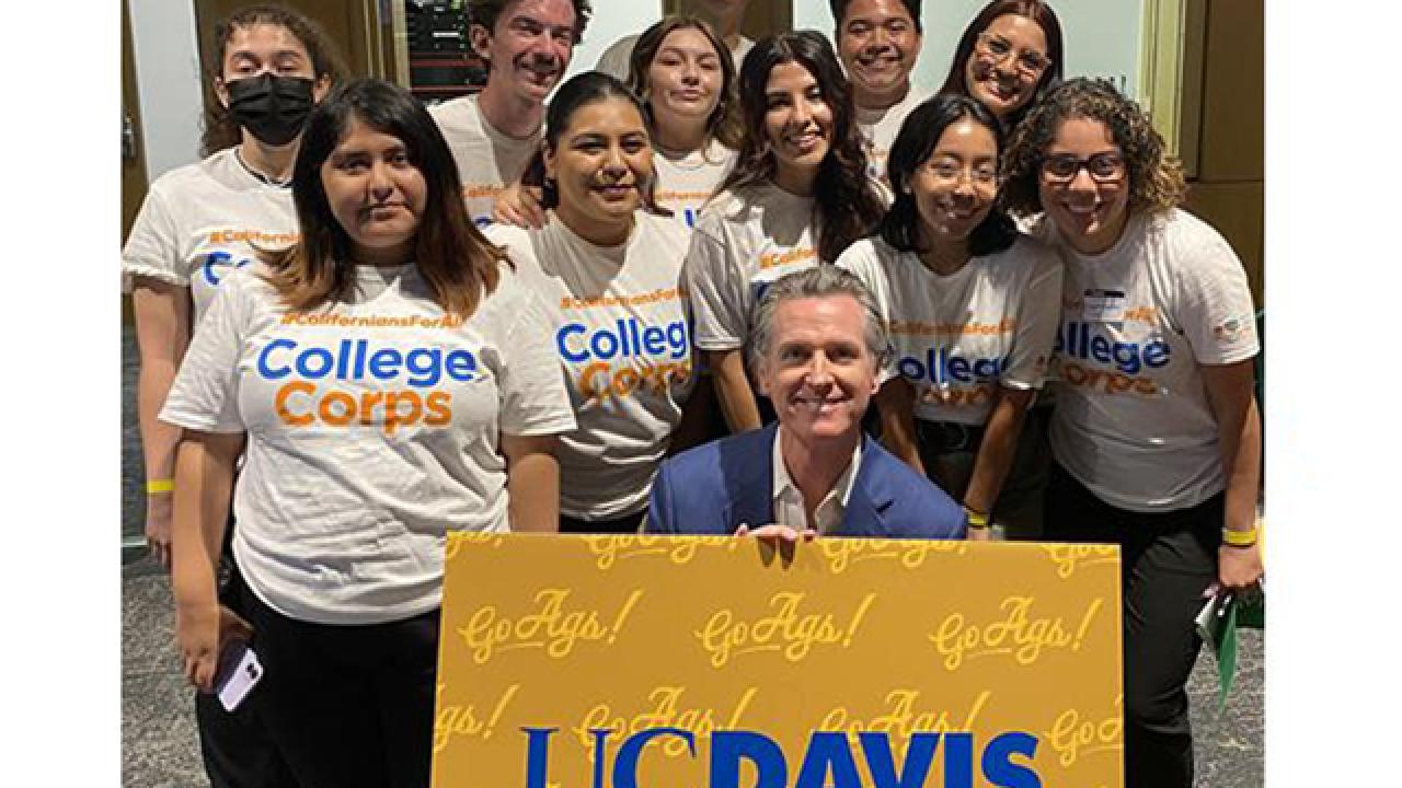 Image of California Governor Newson with a cohort of College Corps students.