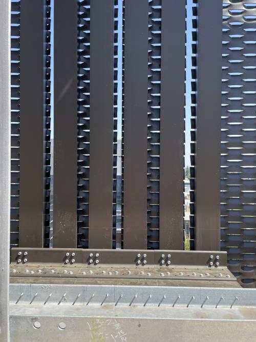 A mechanical screen with horizontal perforations