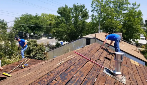 People working on a rooftop