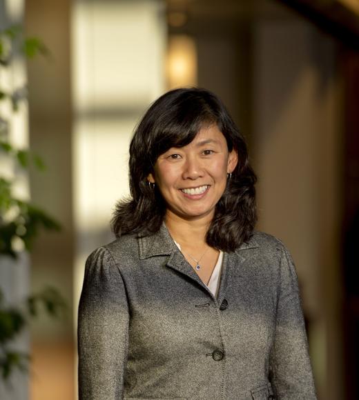 Woman standing and smiling
